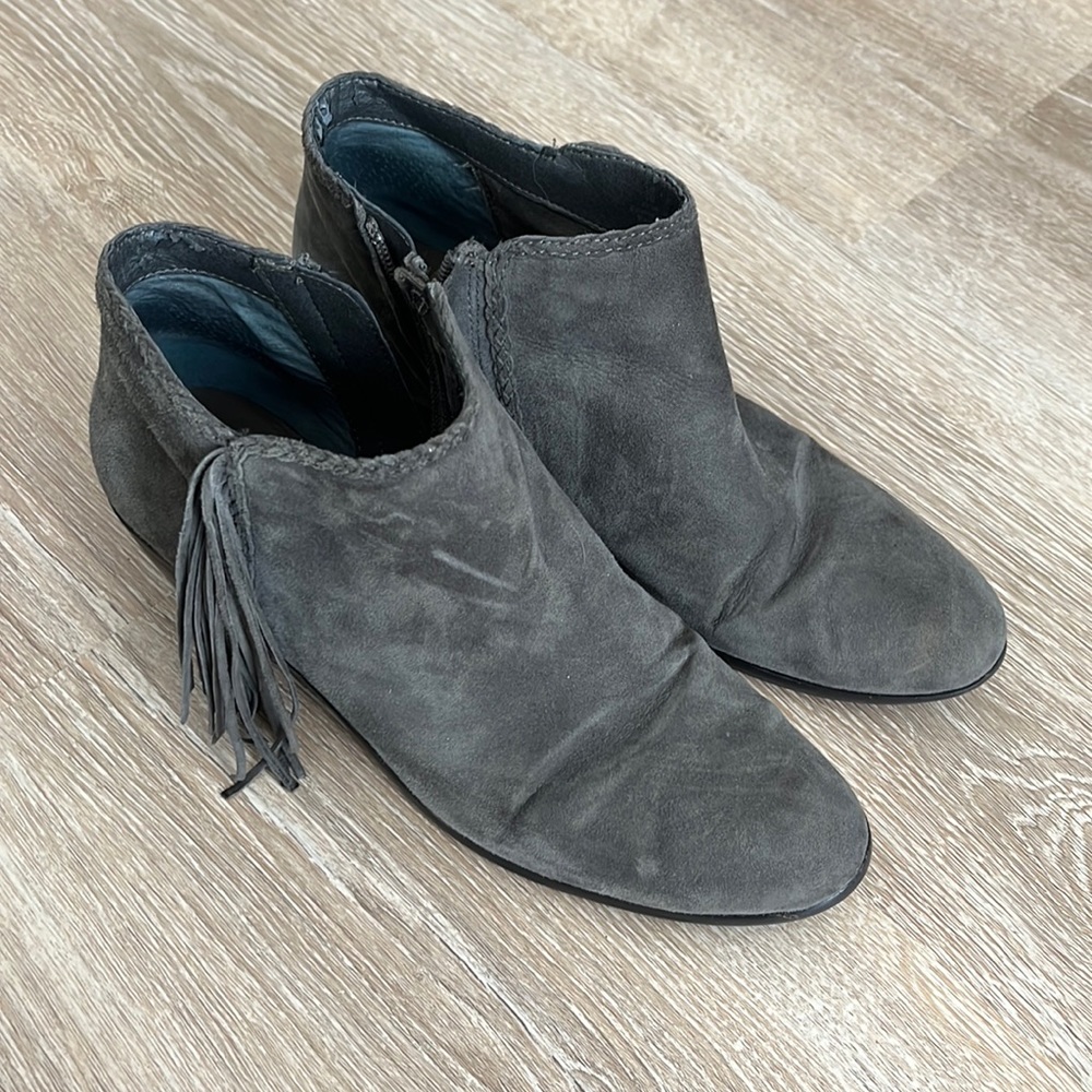 Gray suede booties with fringe accent